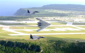 Two F-15E Strike Eagles Flank a B-2 Over Andersen AFB on Guam(USAF Photo, TSgt Cecilio Ricardo)